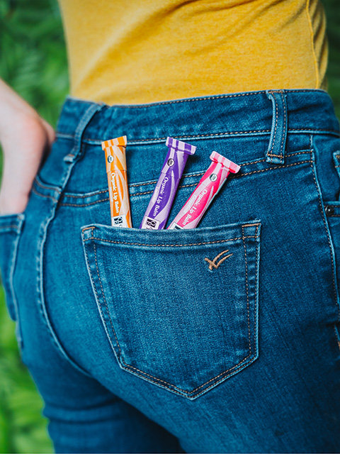 Organic Essence certified organic lip balm in pocket